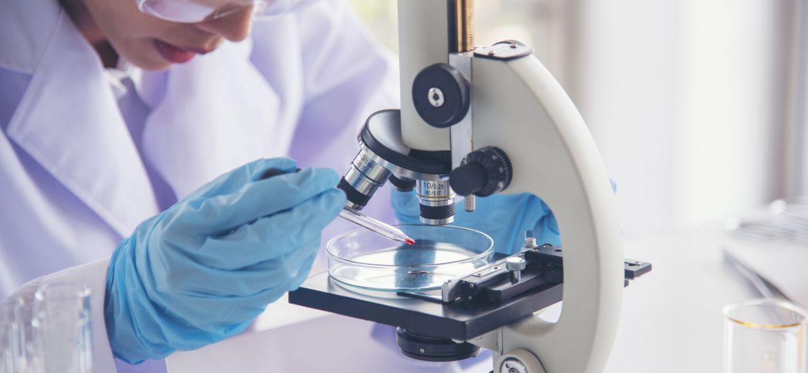 Woman scientist in lab look at science microscope medical test and research biology chemistry. Females technician laboratory analyzing scientific pharmacy genetic research. Chemistry Medical test lab