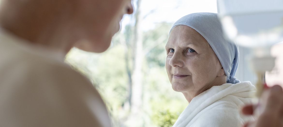 Doctor and senior patient with terminal illness in hospital